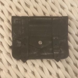 Black Proenza chain wallet clutch